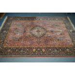 A LATE 20TH CENTURY PINK AND BLUE GROUND RUG, 252cm x 172cm together with two modern carpet
