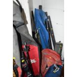 A LARGE QUANTITY OF FISHING ROD BAGS, some with contents, two folding camping chairs, bag containing