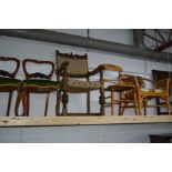 A PAIR OF VICTORIAN WALNUT BALLOON BACK CHAIRS together with an oak rush seated ladder back chair,