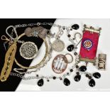 A SELECTION OF JEWELLERY, to include a coin bracelet, an oval cameo panel depicting the three