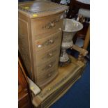 A MODERN CARVED LIGHTWOOD MONKS BENCH, width 97cm, a matching bow front chest of five short drawers,