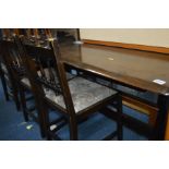 AN ERCOL MEDIUM OAK REFECTORY TABLE, length 183cm and four Ercol chairs (5)