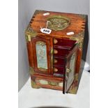 A CHINESE JEWELLERY BOX, circa 1930's, having brass handles and corners, the doors and sides inset