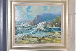 GODWIN BENNETT (BRITISH 1888-1960), a coastal landscape, waves crashing over rocks, seagulls