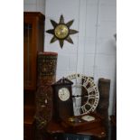 A METAMEC SUNBURST CLOCK together with a modern painted metal garden clock with Roman numeral