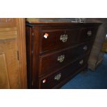 AN EDWARDIAN MAHOGANY CHEST OF TWO SHORT AND TWO LONG DRAWERS on bracket feet, width 107cm x depth