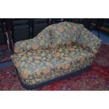 A FLORAL GILT ON BLUE GROUND CHAISE LONGUE, with brass finials and adjustable arm with removable