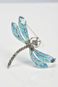 A PLIQUE-A-JOUR DARGONFLY BROOCH/PENDANT, the green and blue plique-a-jour wings with marcasite body