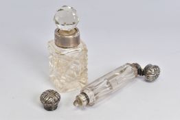 A PERFUME BOTTLE AND A TOILET BOTTLE, the double ended cylindrical bottle with twist cap and stopper