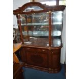 A MODERN ITALIAN DISPLAY CABINET with bowed glass end doors and two central glass doors to the top