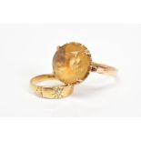 TWO RINGS to include a large single stone citrine, round mixed cut citrine measuring approximately