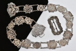 TWO ITEMS, to include a late Victorian silver belt, comprised pierced floral and foliate scroll