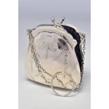 A GEORGE V SILVER PURSE, engraved with ribbons and swags, on a chain with finger ring, blue silk
