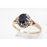 A MODERN 9CT GOLD SAPPHIRE AND DIAMOND CLUSTER RING, hallmarked 9ct gold, ring size V1/2,