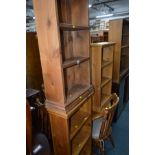 THREE VARIOUS SLIM PINE OPEN BOOKCASES