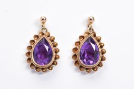 A PAIR OF 9CT GOLD AMETHYST DROP EARRINGS, each designed as a pear shape amethyst within a double