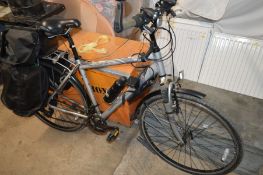 AN APOLLO CAFE TWO LIGHT GREY CITY BICYCLE, with various rear luggage bags and later added