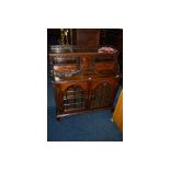 A 19TH CENTURY AND LATER OAK GLAZED TWO DOOR CABINET in the form of an open bureau, with a