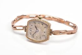 A 1920'S 9CT GOLD ROLEX SIGNED WRISTWATCH, designed with a tonneau shape head with engraved detail