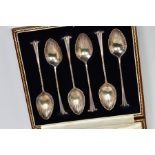 A CASED SET OF SIX SILVER TEASPOONS, each with shell design bowls, twisted stems and tapered