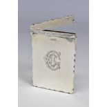 AN EDWARDIAN SILVER CARD CASE OF WAVY RECTANGULAR FORM, engraved monogram to front, maker Willaim