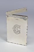 AN EDWARDIAN SILVER CARD CASE OF WAVY RECTANGULAR FORM, engraved monogram to front, maker Willaim