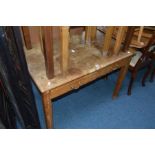 AN EARLY TO MID 20TH CENTURY OAK DESK with two drawers, width 106cm x depth 68cm x height 76cm