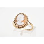 A 9CT GOLD CAMEO RING, the oval cameo panel depicting a lady in profile within a rope twist surround