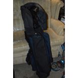 A GOLF BAG, containing TT's golf clubs