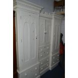 A LATE 19TH CENTURY WHITE PAINTED SCUMBLED PINE COMPACTUM WARDROBE of four various cupboard doors