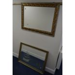 A DECORATIVE RECTANGULAR BEVELLED EDGE WALL MIRROR, 107cm x 77cm and a another modern wall mirror (