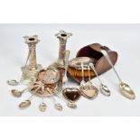 A SELECTION OF SILVERWARE, to include a pair of late Victorian silver candlesticks of pillar design,