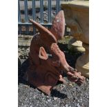 A TERRACOTTA ROOF TOP FIGURE HEAD, of a mythical dragon creature with open wings