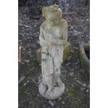 A COMPOSITE GARDEN FIGURE OF A STANDING SEMI CLAD WOMAN, height 117cm