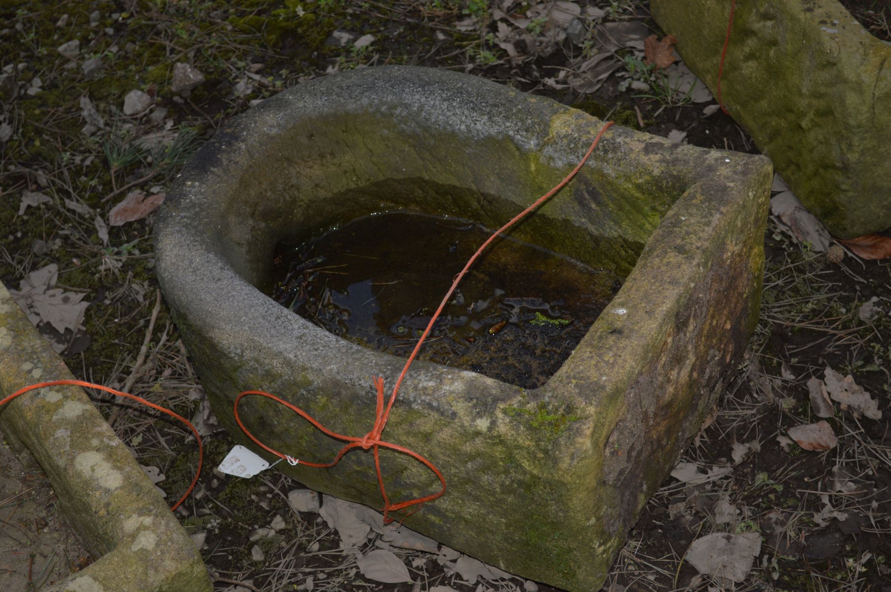 A SANDSTONE PUMP TROUGH, width 42cm x depth 56cm x height 26cm