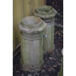 A PAIR OF CLAY OCTAGONAL CHIMNEY POTS, height 78cm (one chimney top s.d.)
