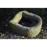 A SANDSTONE PUMP TROUGH, width 44cm x depth 54cm x height 26cm