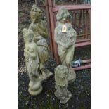 THREE VARIOUS COMPOSITE GARDEN FIGURES, of three semi clad women (s.d to one figure) and a garden