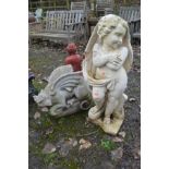A COMPOSITE GARDEN FIGURE OF A PUTTO, height 80cm, together with a composite mythical creature (2)