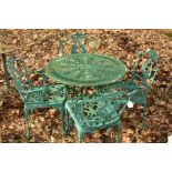 A GREEN GROUND CIRCULAR ALUMINIUM GARDEN TABLE, diameter 80cm x height 69cm and four chairs