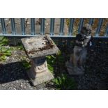 A COMPOSITE SQUARE TOPPED BIRD BATH, on a separate base, height 54cm, together with a composite