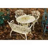 A WHITE GROUND CIRCULAR ALUMINIUM GARDEN TABLE, with foliate decoration, diameter 80cm x height