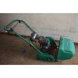 A QUALCAST CLASSIC 35S PETROL CYLINDER LAWNMOWER, with grass box