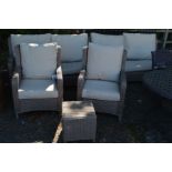 AN LG OUTDOOR RATTAN FIVE PIECE GARDEN SET, comprising two x two seater settees, a pair of armchairs