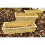 A PAIR OF COMPOSITE RECTANGULAR BRICK EFFECT GARDEN PLANTERS, width 66cm and another similar