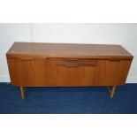 A 1970'S TEAK SIDEBOARD, with a single drawer flanked by cupboard doors, width 169cm x depth 46cm