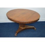 A VICTORIAN WALNUT BREAKFAST TABLE, on a triform base, diameter 118cm x 73cm