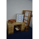 A MODERN PINE DESK, with six drawers, together with a pine open bookcase, painted chest of four