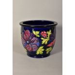 A MOORCROFT POTTERY FOOTED JARDINIERE, Anemone pattern on blue ground, impressed and painted marks