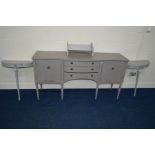 A GREY PAINTED SIDEBOARD, together with a pair of painted console tables and a book stand (4)